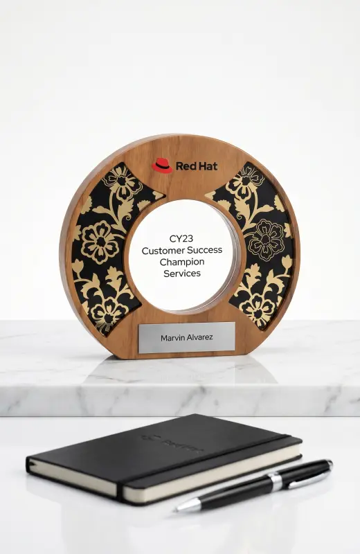 this is front view of redhat wood trophy that is 15cm in diameter and 2cm thick with a hole where we place acrylic with the title.