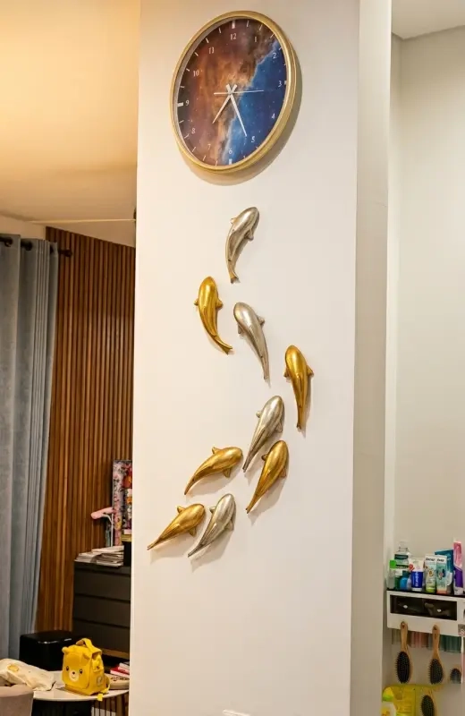 koi fish wall decor 3d print on a wall below the clock to adorn the interior.