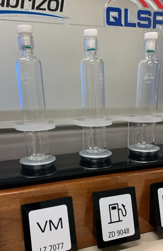 acrylic lubrizol display rack holds 4 vial of different lubricants.