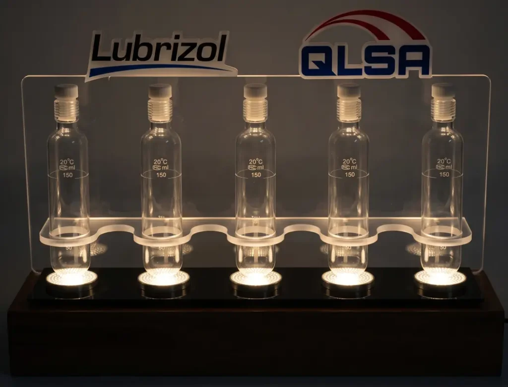 acrylic lubrizol display rack with dark setting. This is perfect for trade show.