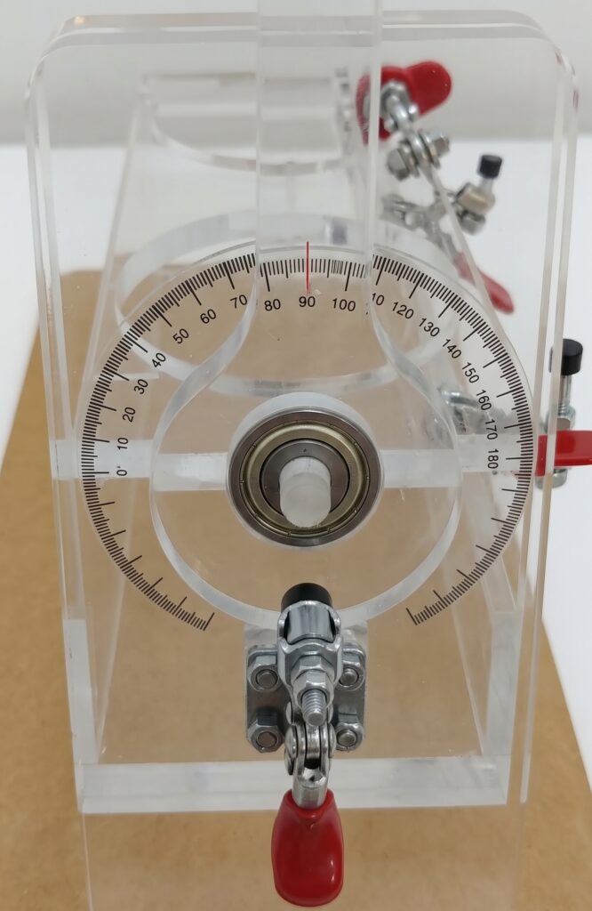 this image shoes the angle dial on the handle on lubrizol flowability test kit.